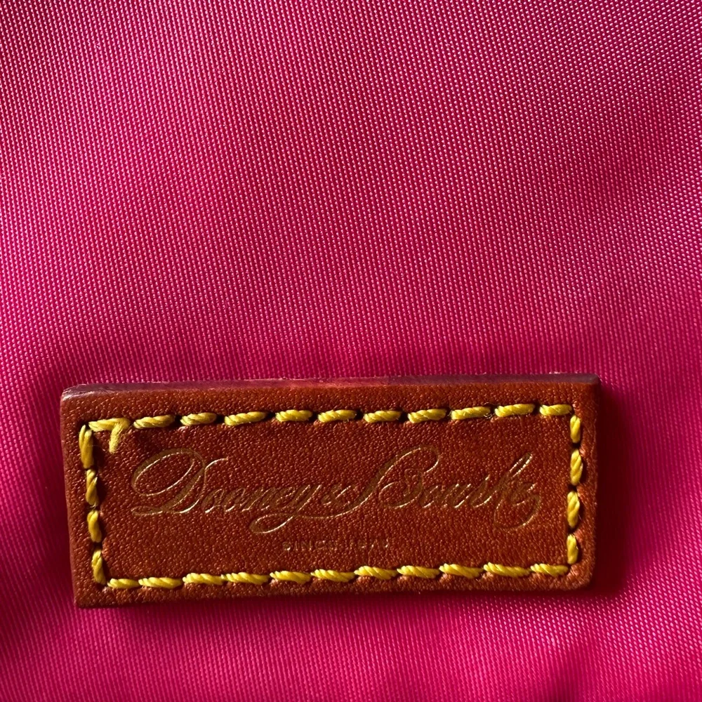 Dooney & Bourke Nylon North South Triple Zip Crossbody in Fuchsia